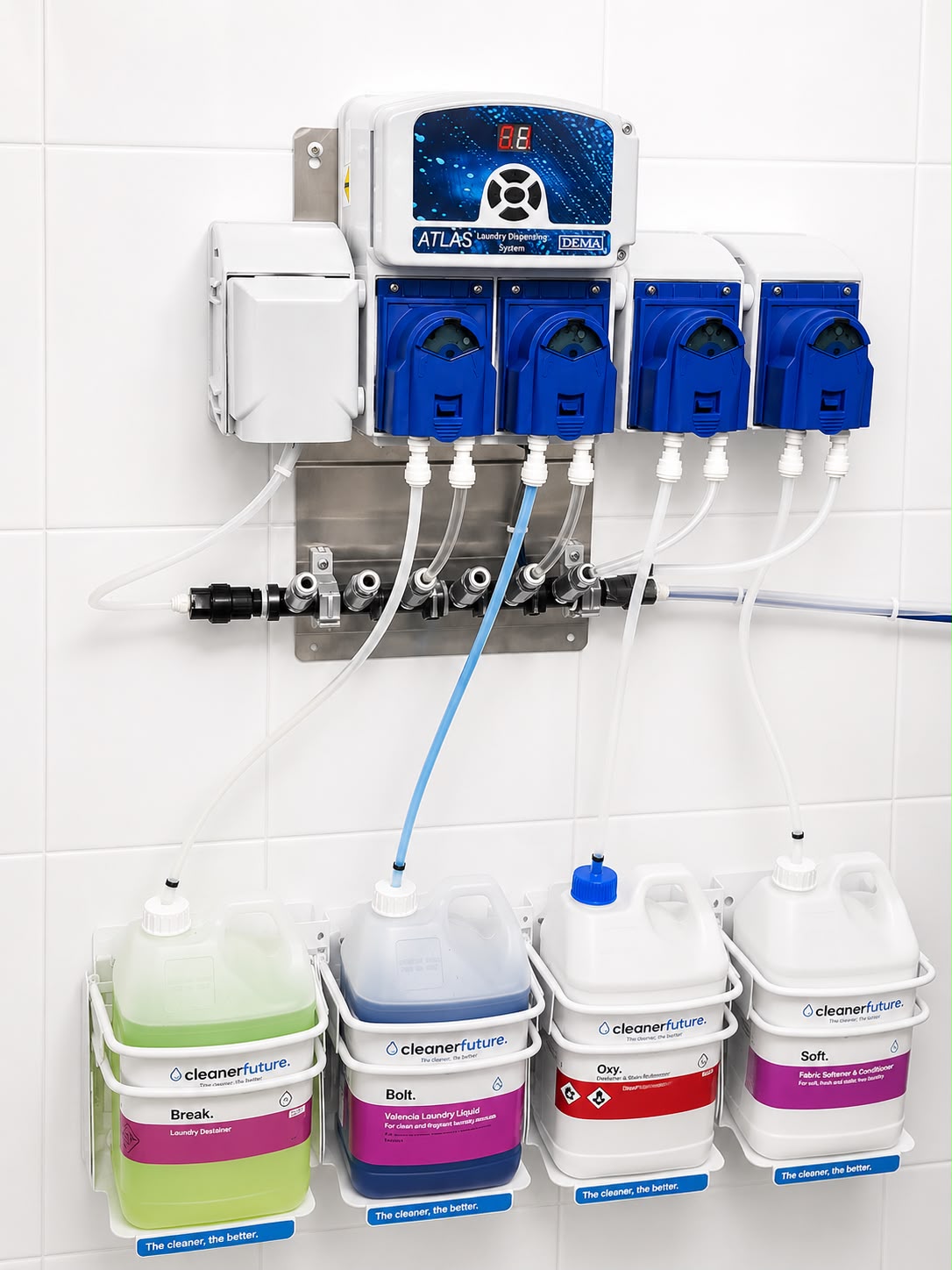 Cleaner Future precision dosing system installed on a laundry wall with Break, Bolt, Oxy and Soft racked underneath